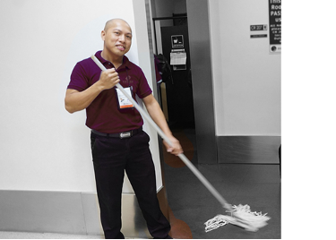 Staff Member Doing School Cleaning