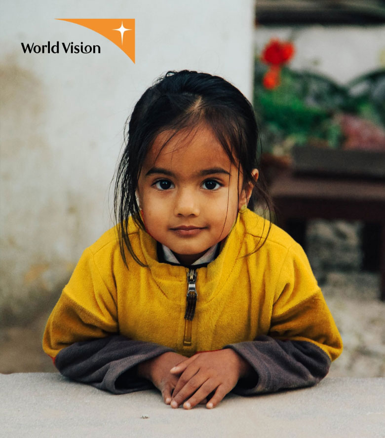 World Vision - Girl In Yellow Jacket